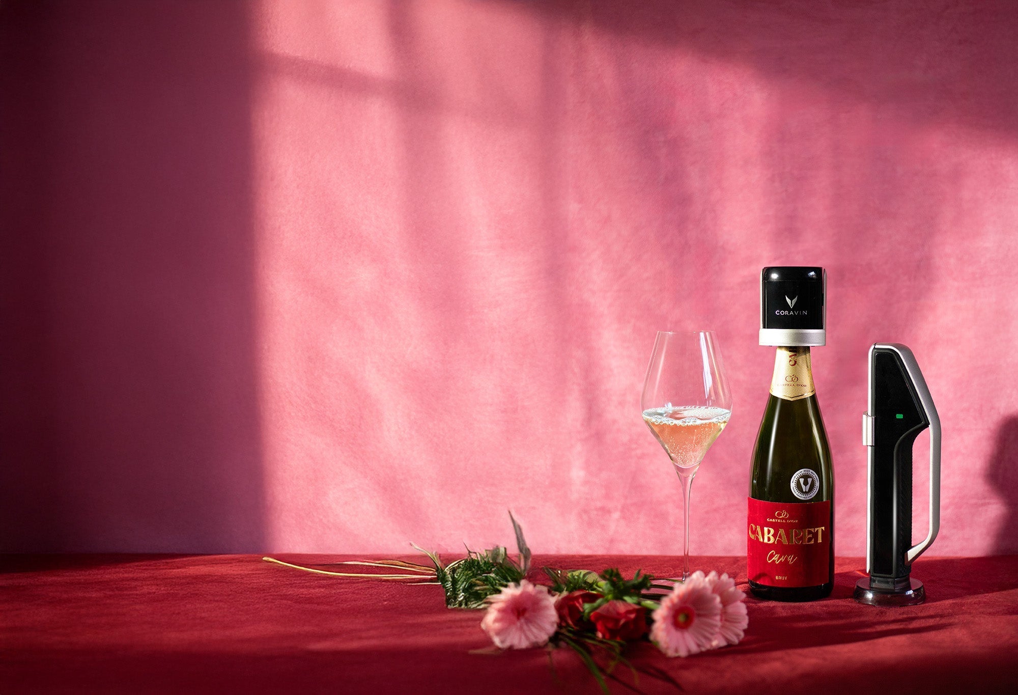 mothers day coravin sparkling against pink wall